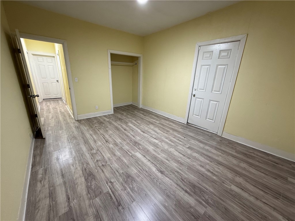 3001 Ruth Street Corpus Christi, TX 78405 - Photo 15 of 27 an empty room with wooden floor and a window