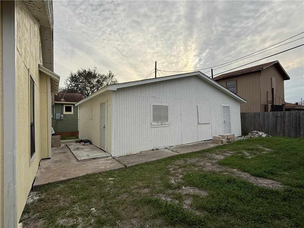 3001 Ruth Street Corpus Christi, TX 78405 - Photo 2 of 27 a backyard of a house with lots of green space
