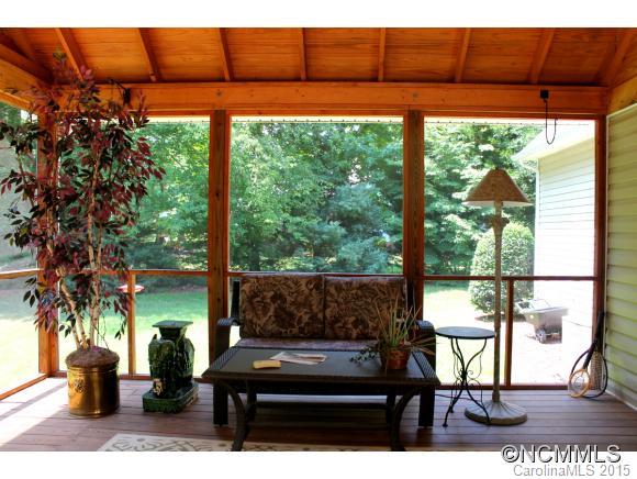223 General Griffith Circle Rutherfordton, NC 28139 - Photo 14 of 24 a view of a porch with furniture and a yard