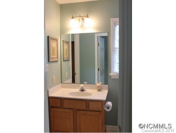 223 General Griffith Circle Rutherfordton, NC 28139 - Photo 21 of 24 a bathroom with a sink and a mirror