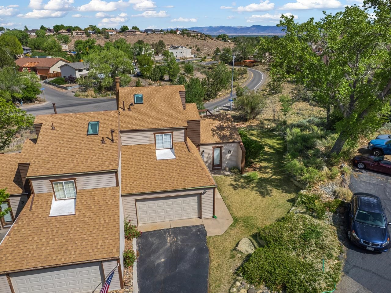 383 Explorer Court, Unit B Grand Junction, CO 81507 - Photo 39 of 40 an aerial view of residential houses with outdoor space