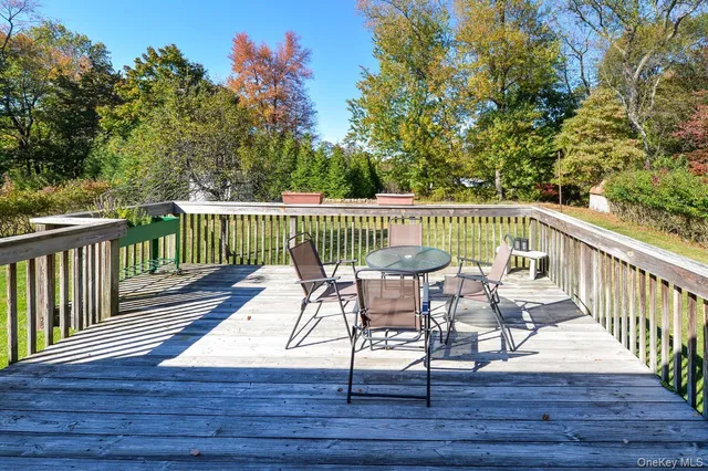 a view of a deck with furniture