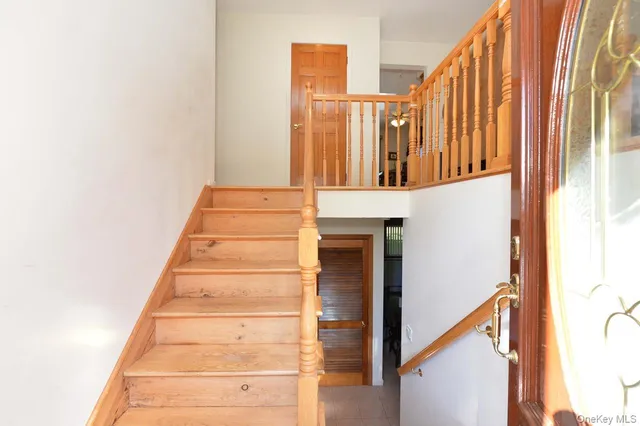 a view of staircase with large window