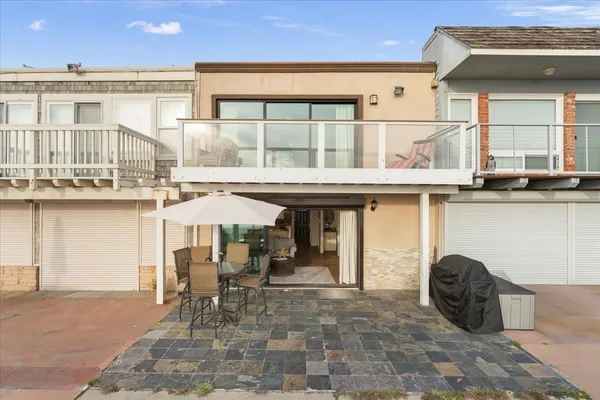 a lawn chairs sitting in front of a building