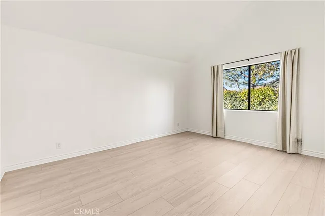 an empty room with window