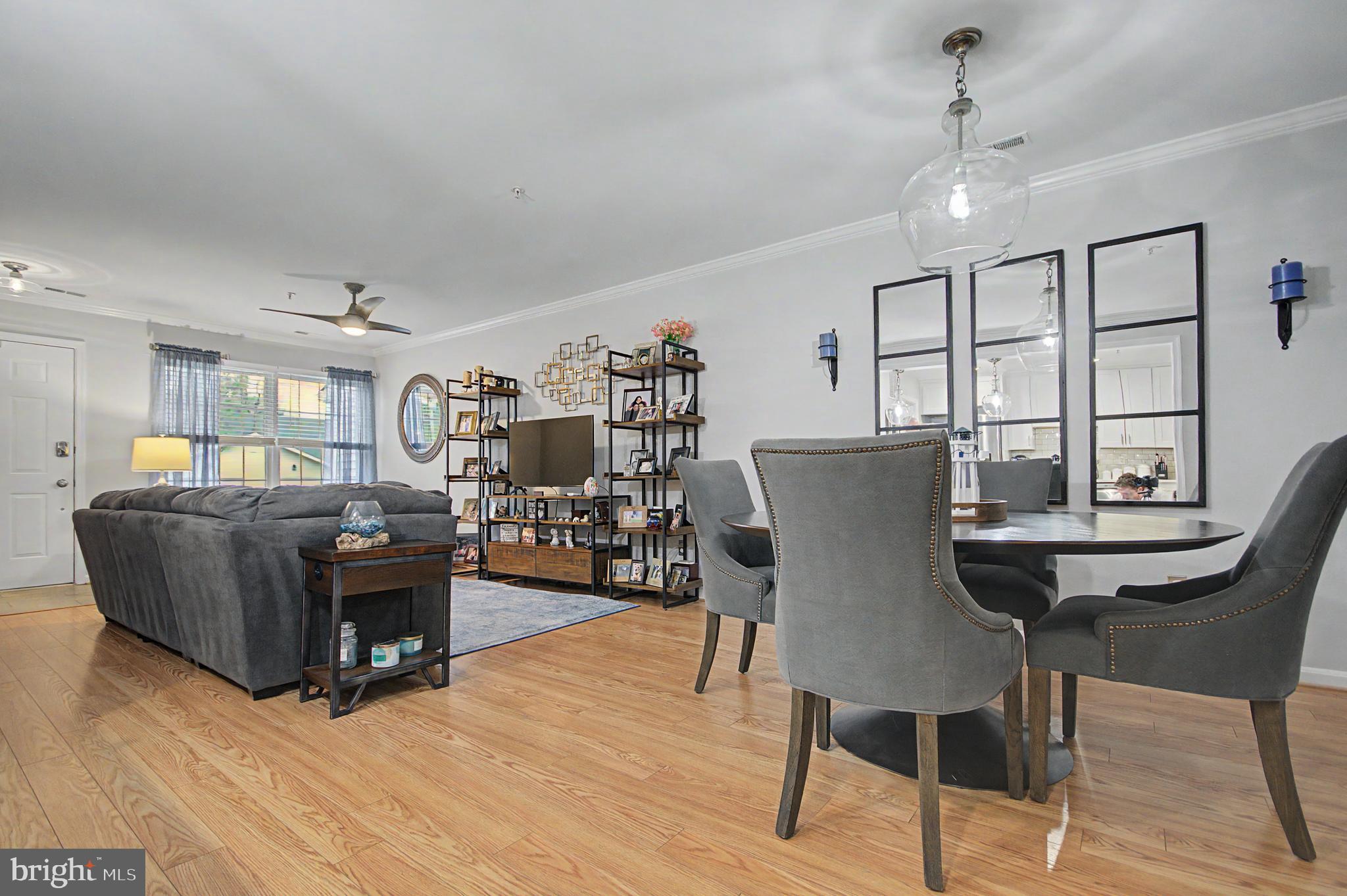 2607 Compass Drive Annapolis, MD 21401 - Photo 13 of 61 a view of a dining room with furniture and wooden floor
