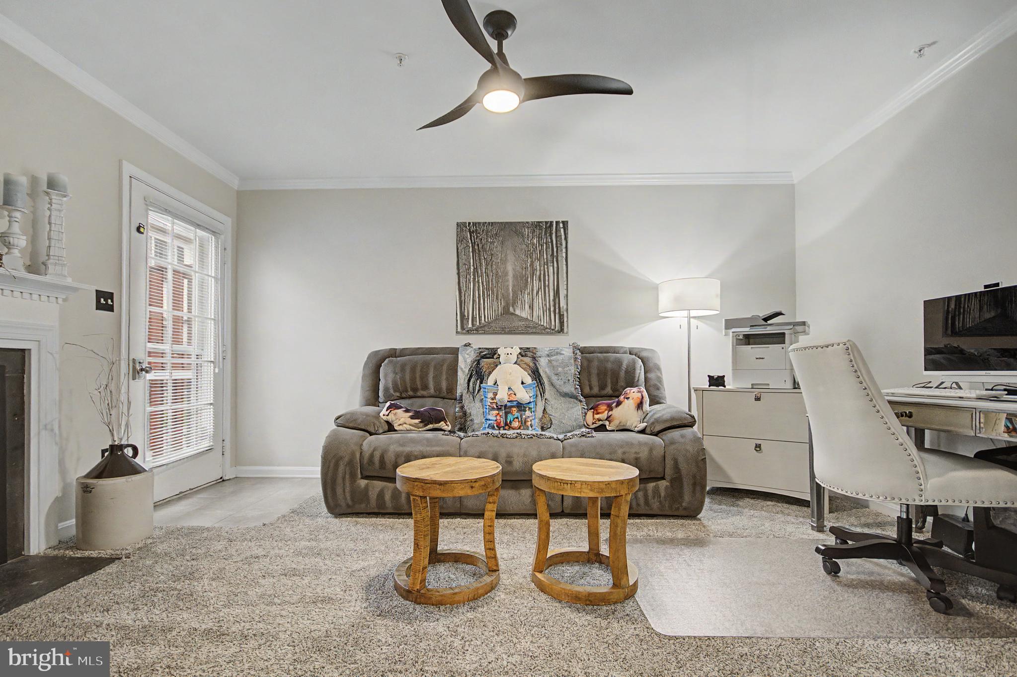 2607 Compass Drive Annapolis, MD 21401 - Photo 25 of 61 a living room with furniture a rug and a window