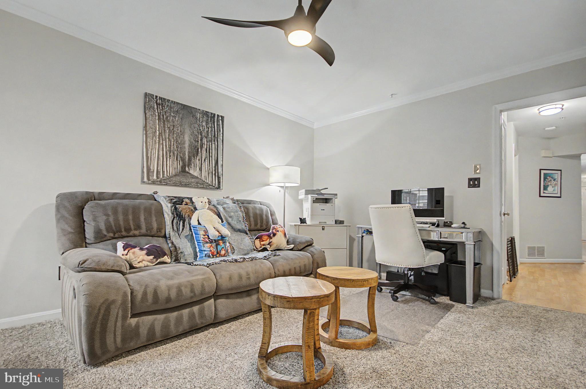 2607 Compass Drive Annapolis, MD 21401 - Photo 27 of 61 a living room with furniture and a couch