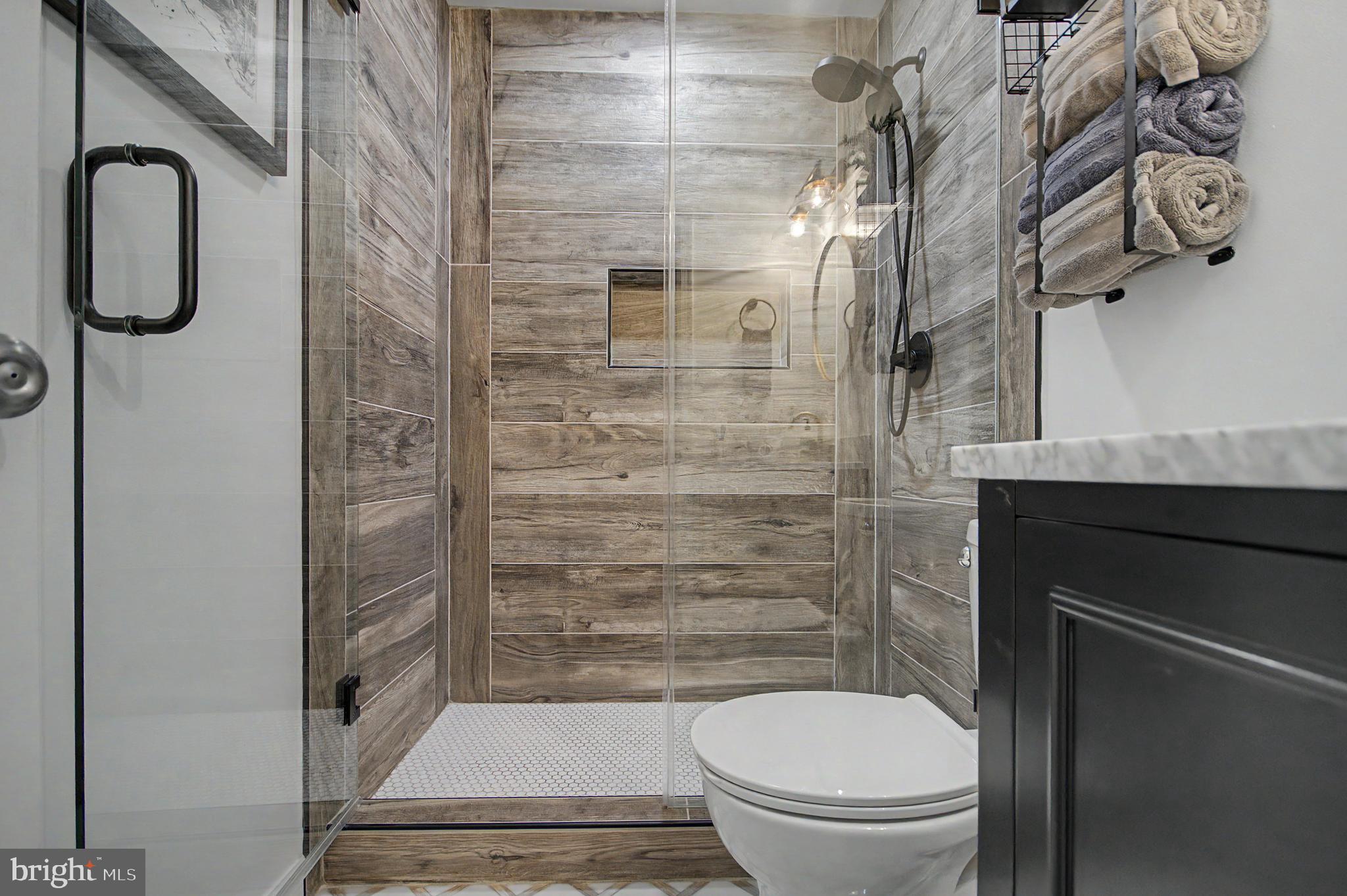2607 Compass Drive Annapolis, MD 21401 - Photo 37 of 61 a bathroom with a toilet and a shower