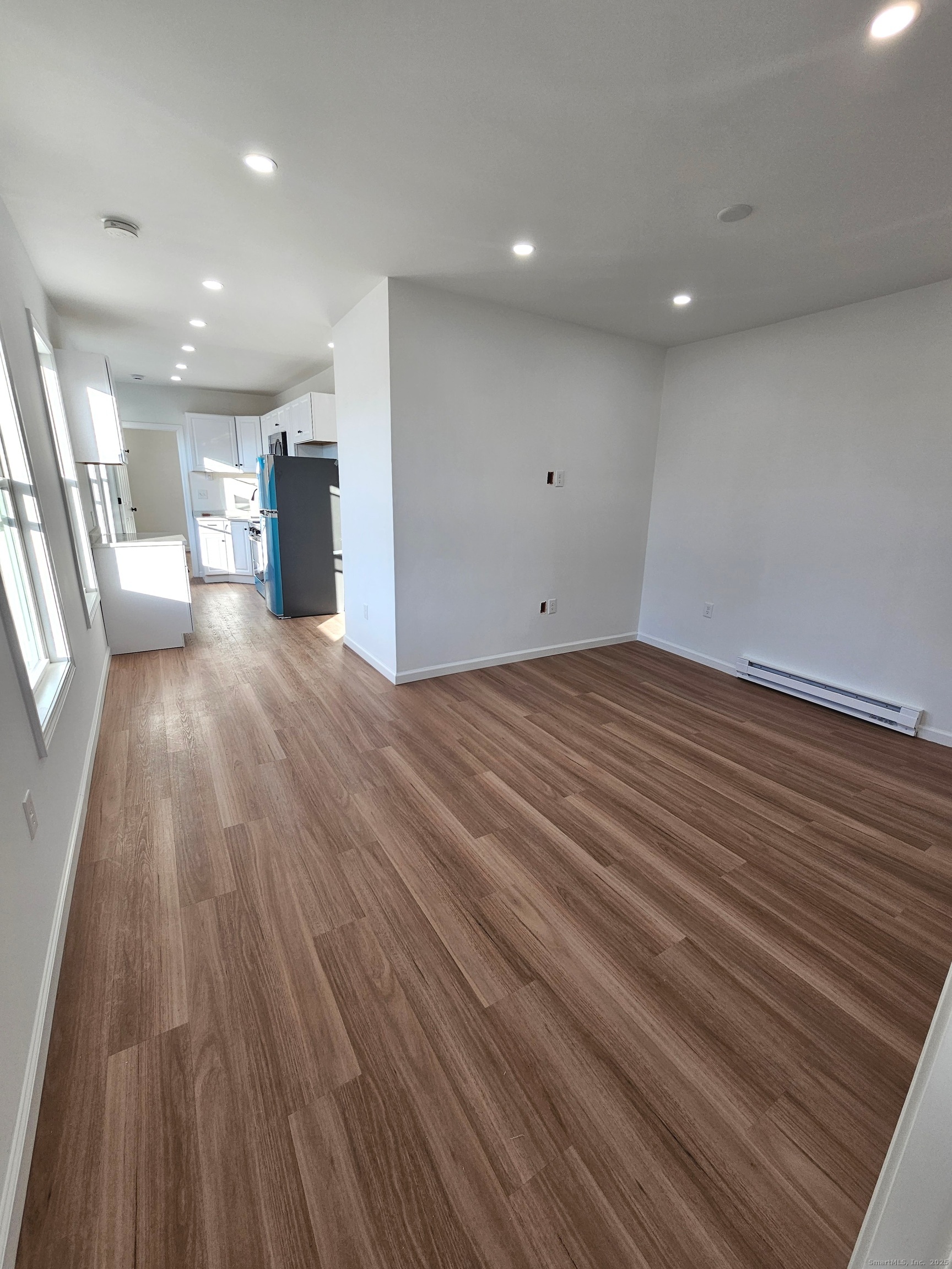 1153 Main Street, Unit 3B Windham, CT 06226 - Photo 5 of 11 Living room is conveniently located off the kitchen