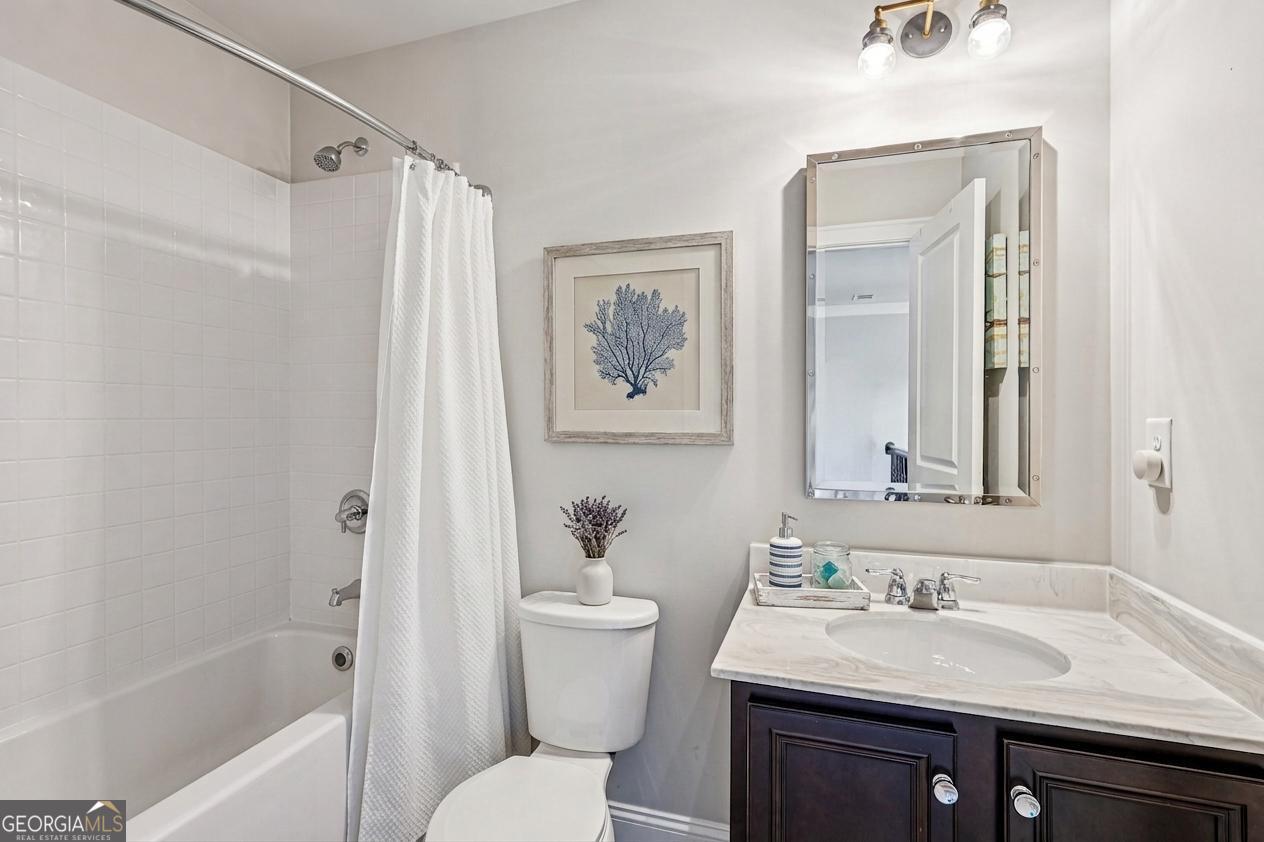 17 Lake Sydney Drive Dawsonville, GA 30534 - Photo 19 of 52 a bathroom with a sink toilet and shower