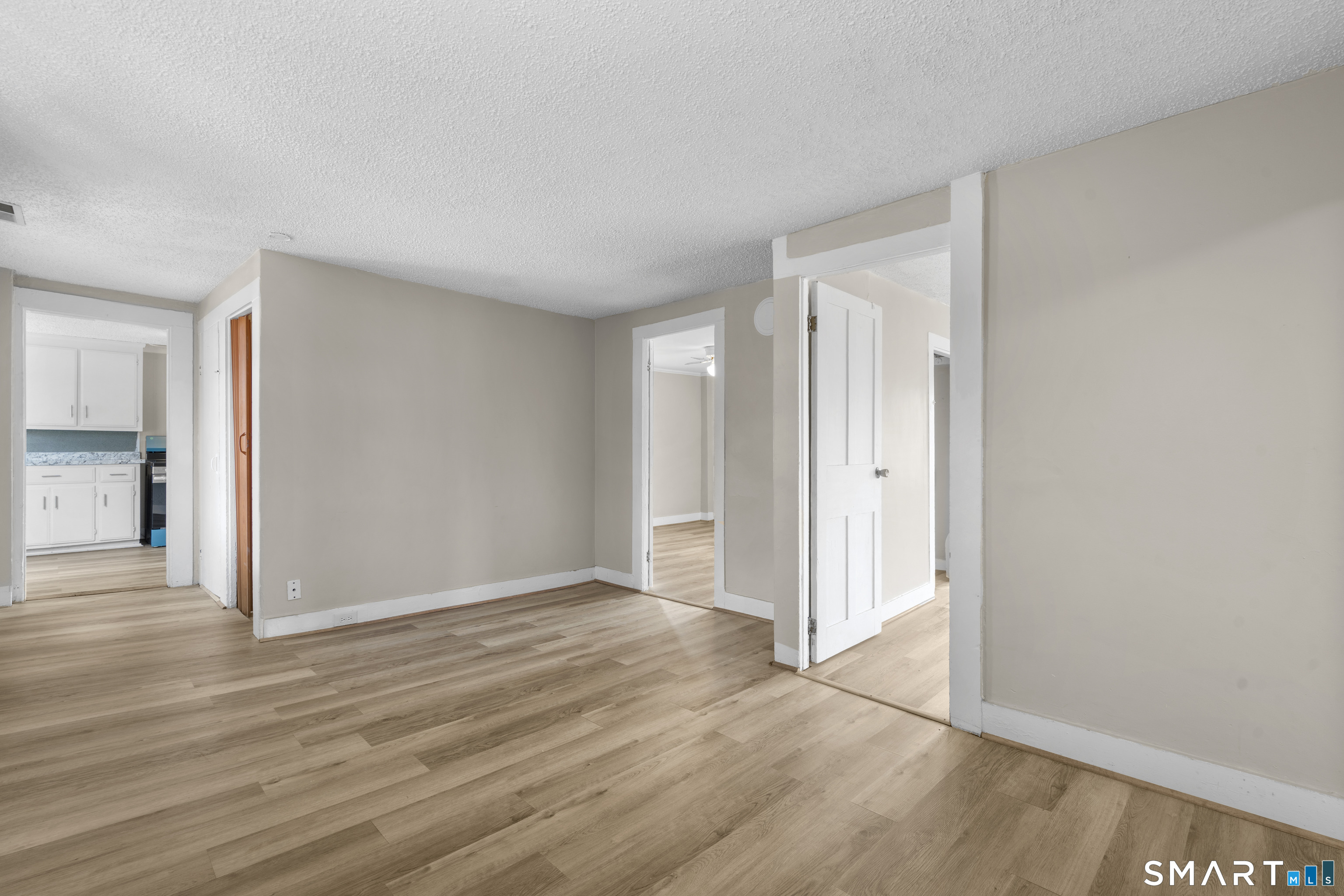 301 Queen Street Bristol, CT 06010 - Photo 15 of 26 wooden floor in an empty room