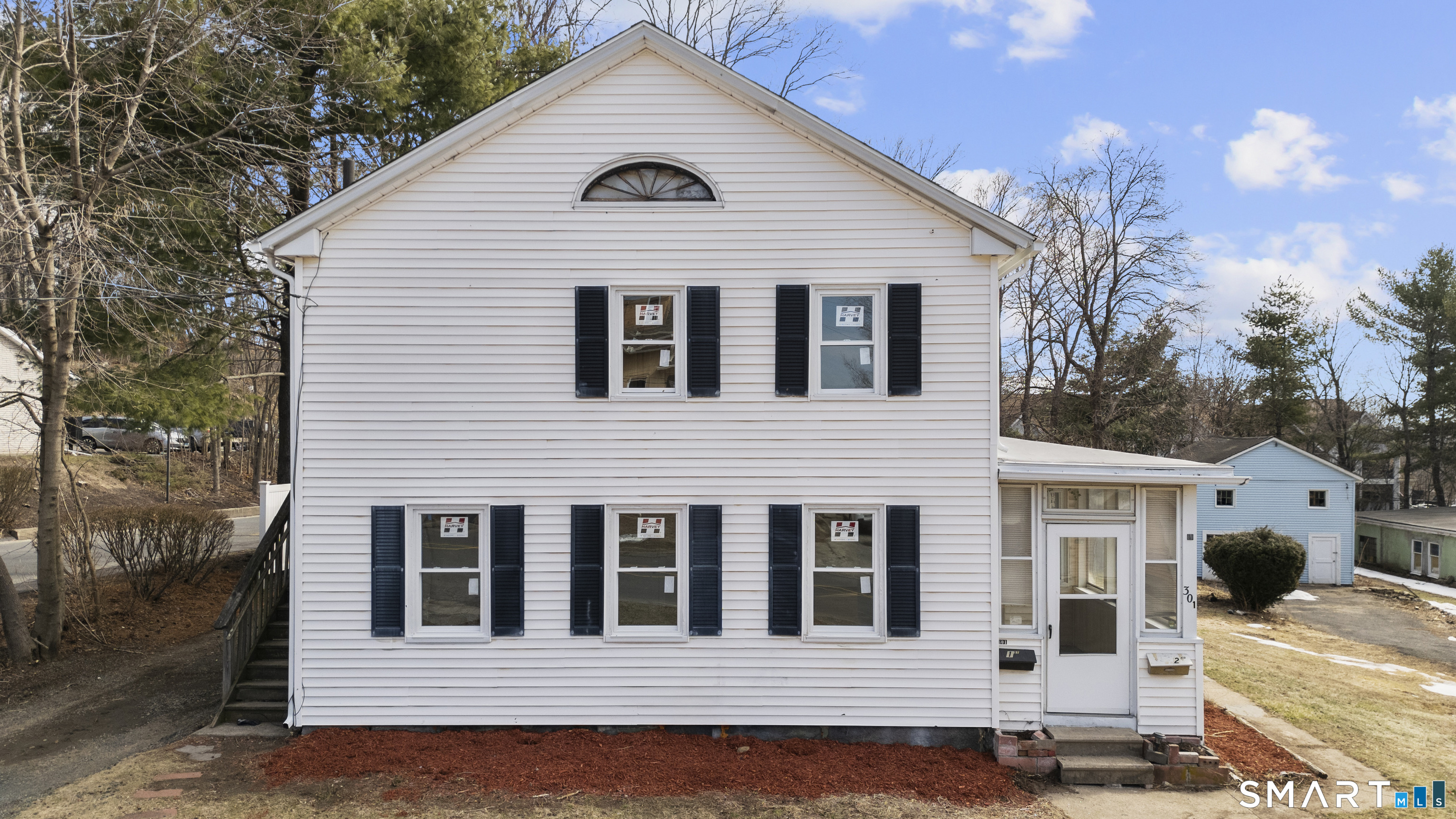 301 Queen Street Bristol, CT 06010 - Photo 2 of 26 a front view of a house with a balcony