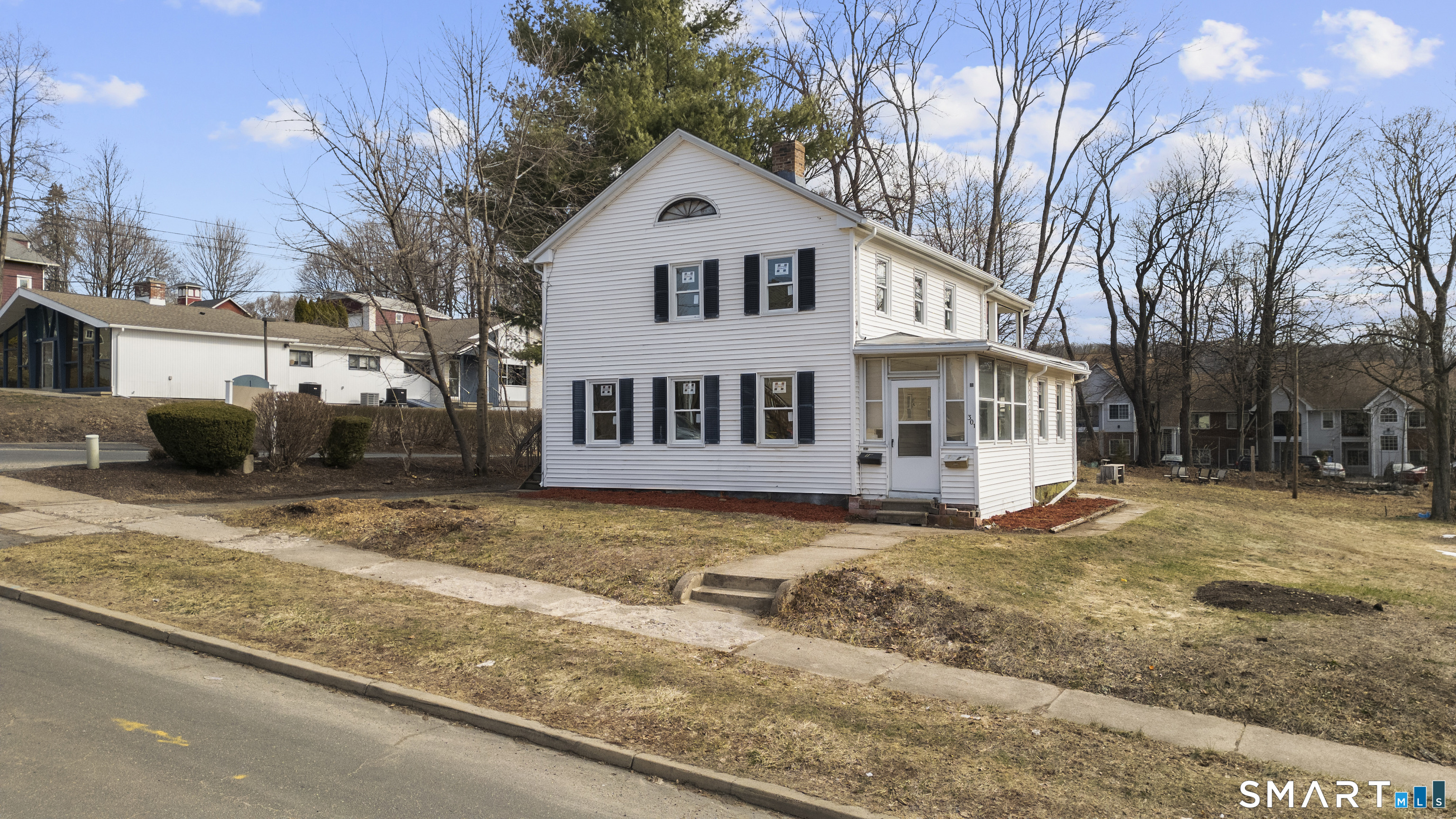 301 Queen Street Bristol, CT 06010 - Photo 4 of 26 a house view with a outdoor space