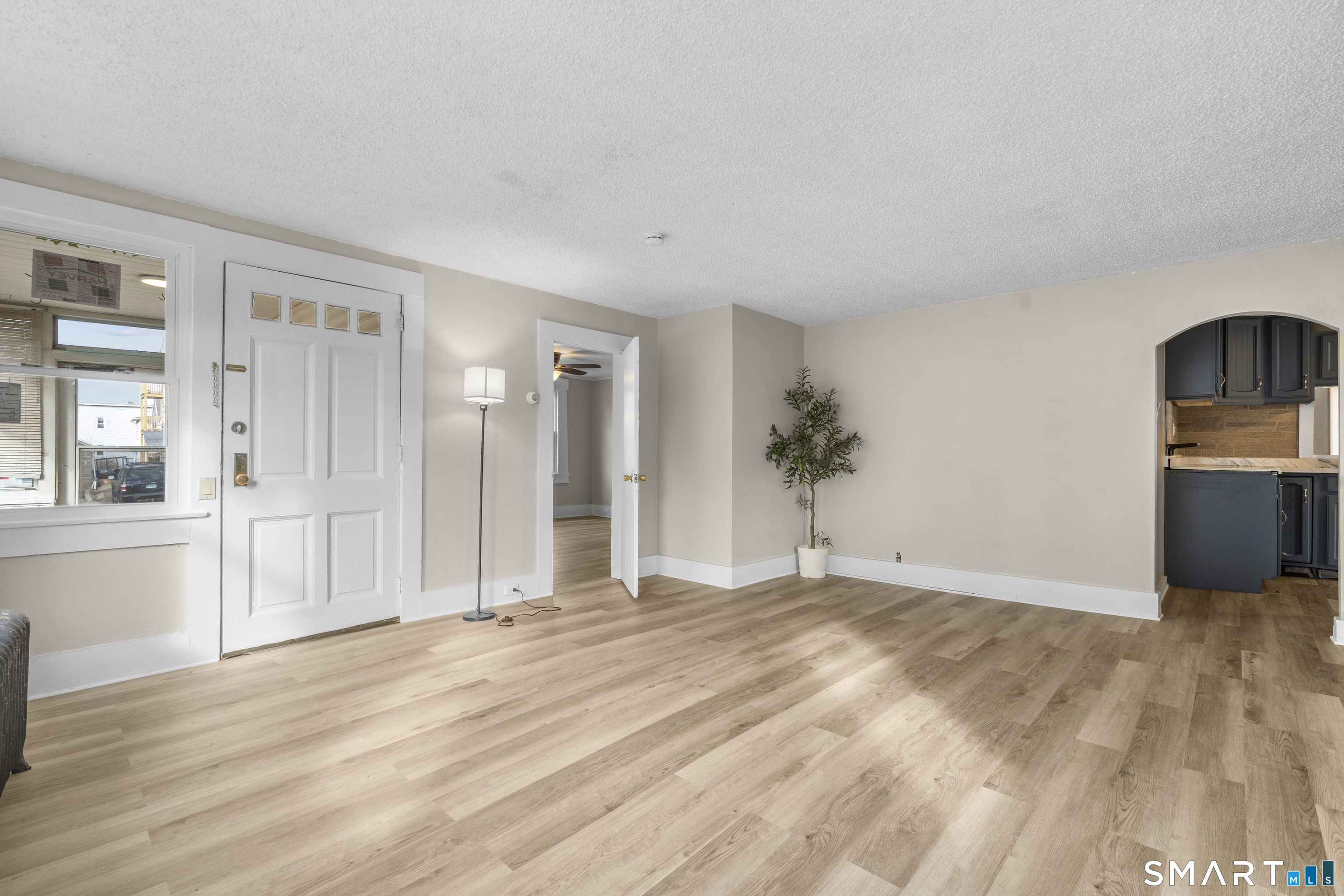 301 Queen Street Bristol, CT 06010 - Photo 7 of 26 a view of an empty room with a window