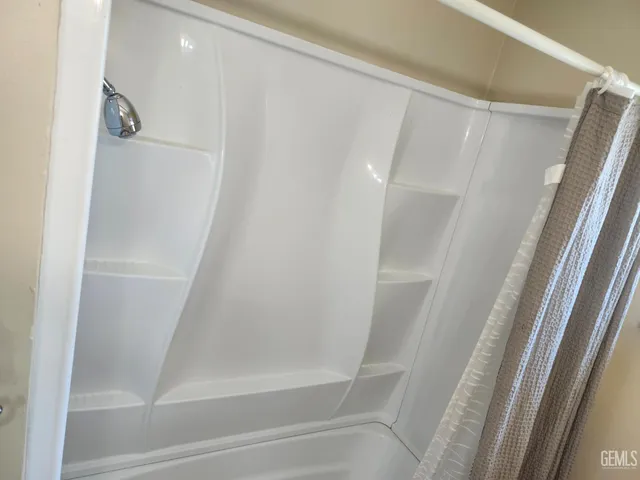 a bathroom with a sink and toilet