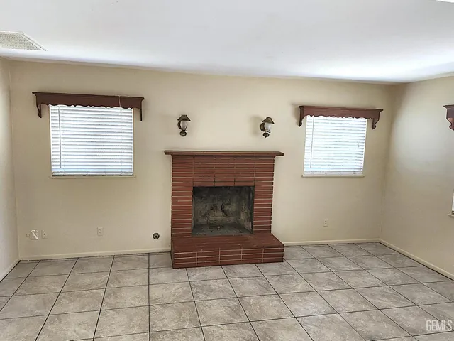 a living room with a fireplace
