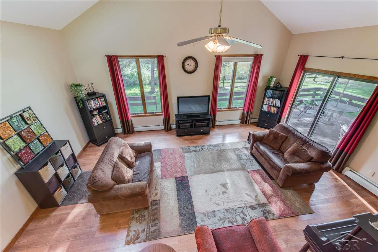 3201 Pomranky Road Midland, MI 48640 - Photo 5 of 29 This perspective was taken from the open stairway that leads to the master bedroom. It over looks the living area.