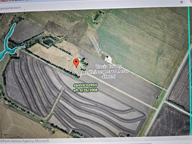 a view of a hallway with an entryway