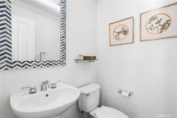 a bathroom with a toilet and a sink