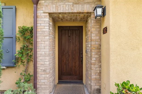 a front view of a house with a glass door