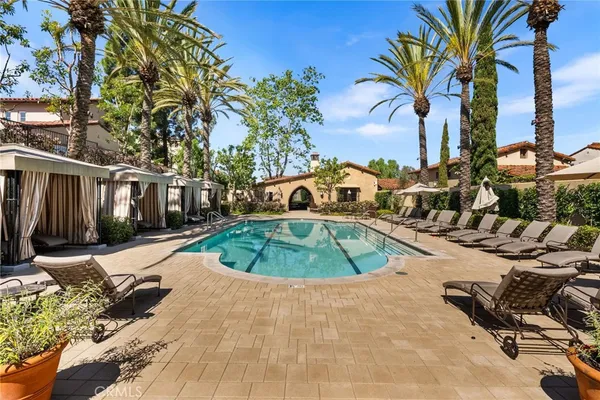 a view of a swimming pool with a patio