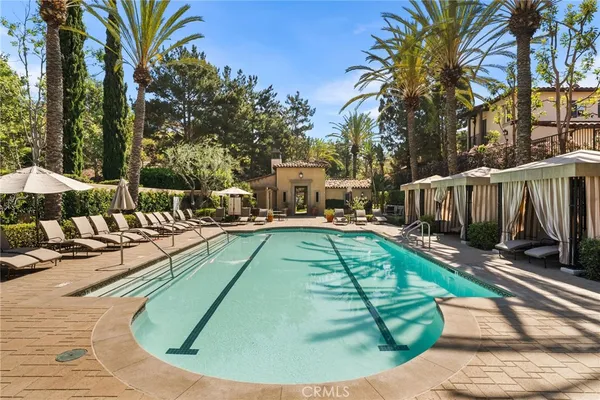 a view of a swimming pool with a patio