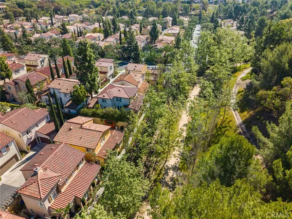 an aerial view of a city with lots of residential buildings