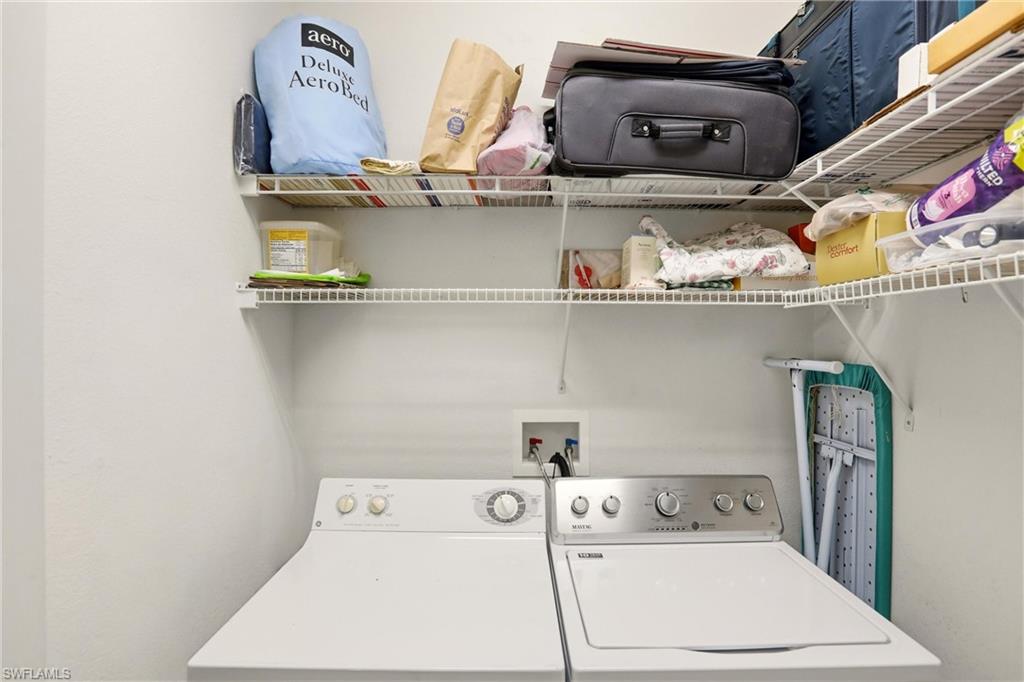 511 Joseph Court, Unit 2 Naples, FL 34104 - Photo 42 of 50 a utility room with dryer and washer