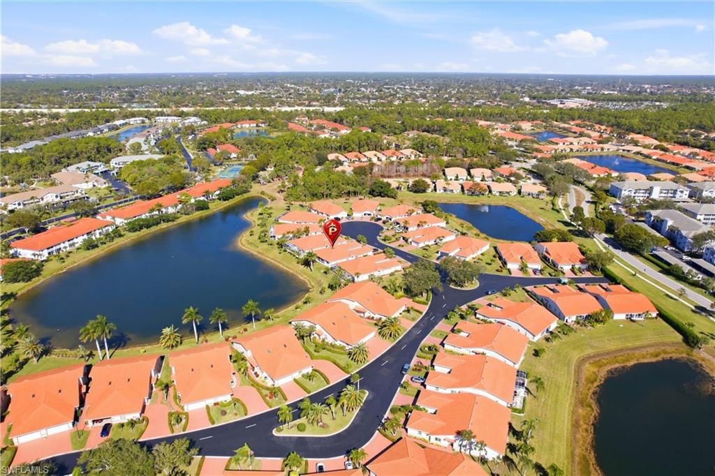511 Joseph Court, Unit 2 Naples, FL 34104 - Photo 47 of 50 an aerial view of residential houses with outdoor space