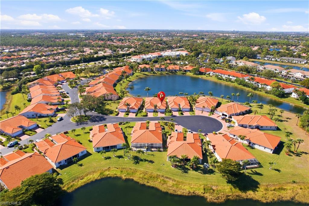 511 Joseph Court, Unit 2 Naples, FL 34104 - Photo 48 of 50 an aerial view of residential houses with outdoor space