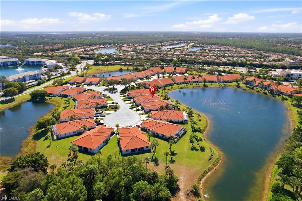 511 Joseph Court, Unit 2 Naples, FL 34104 - Photo 49 of 50 an aerial view of residential houses with outdoor space