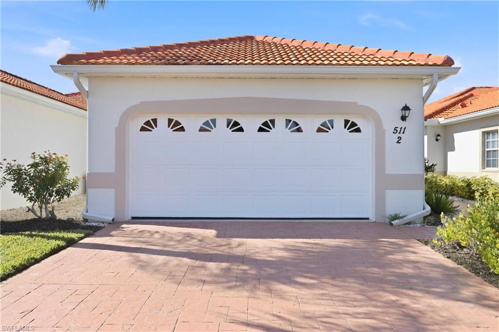 511 Joseph Court, Unit 2 Naples, FL 34104 - Photo 5 of 50 a front view of a house