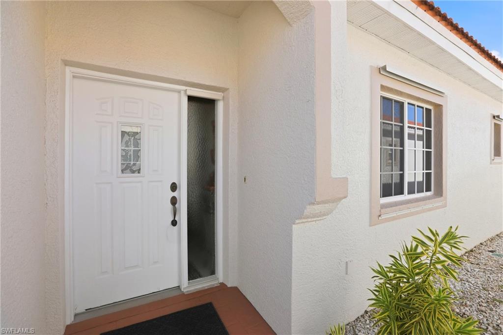 511 Joseph Court, Unit 2 Naples, FL 34104 - Photo 8 of 50 a view of front door