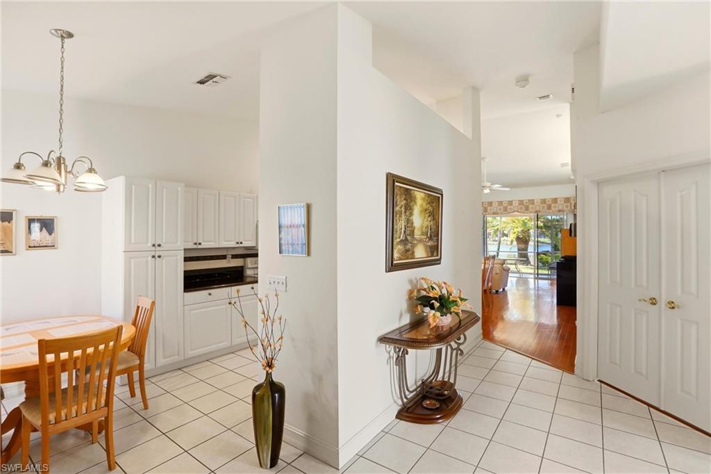 511 Joseph Court, Unit 2 Naples, FL 34104 - Photo 10 of 50 a view of a livingroom with furniture and a window