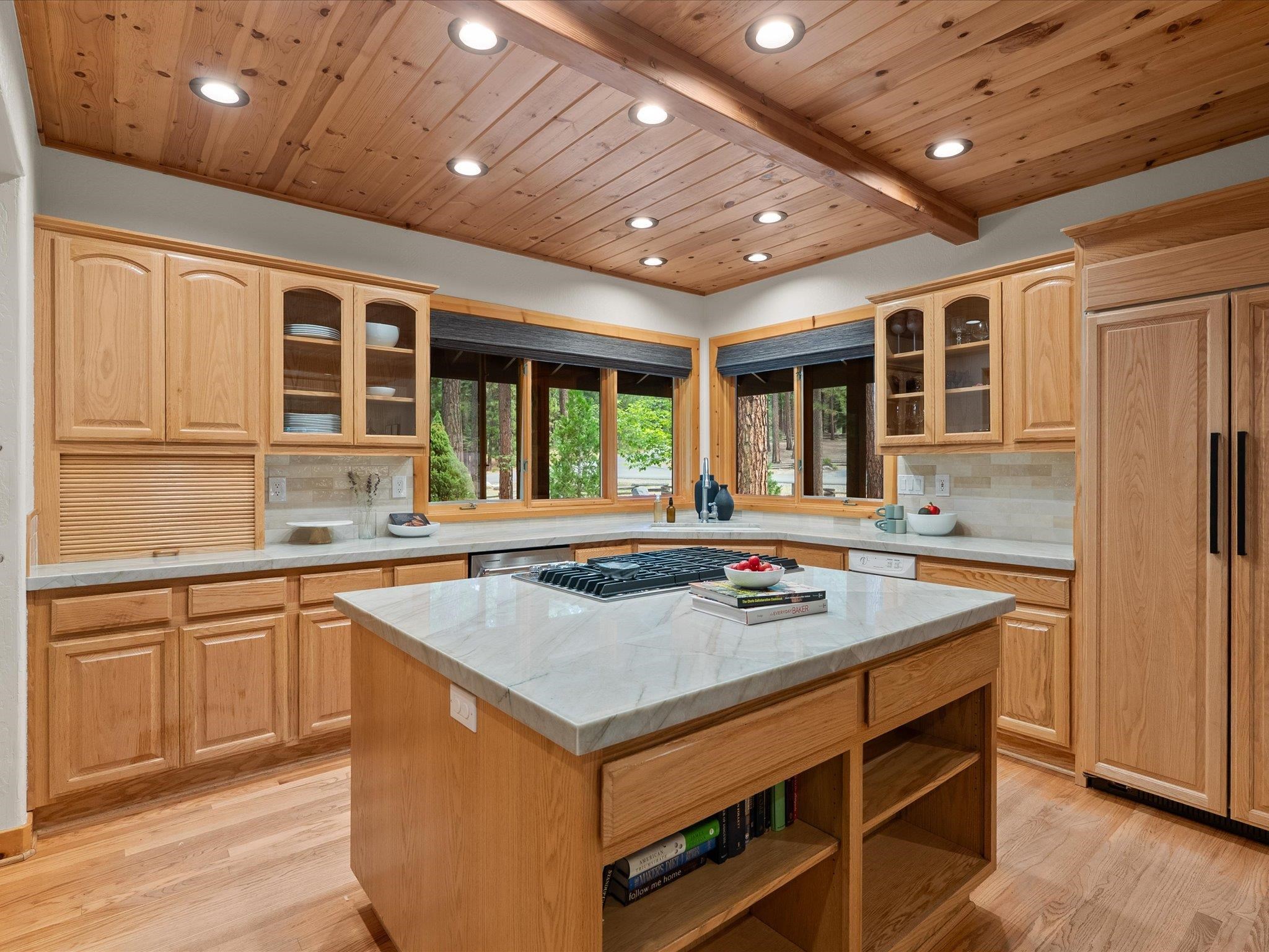 355 Quail View Circle Clio, CA 96106 - Photo 16 of 48 a kitchen with a stove sink and cabinets