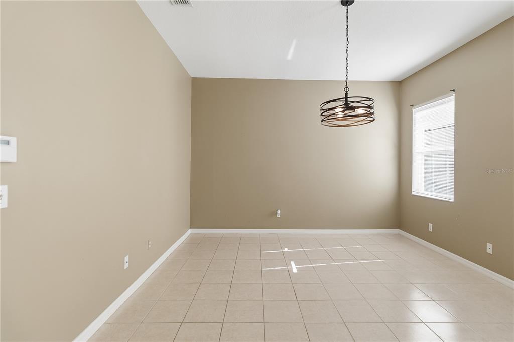 677 Buckhaven Loop Ocoee, FL 34761 - Photo 15 of 41 a view of an empty room with a window