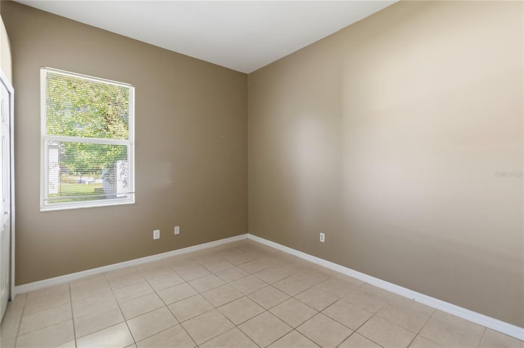 677 Buckhaven Loop Ocoee, FL 34761 - Photo 19 of 41 an empty room with a window