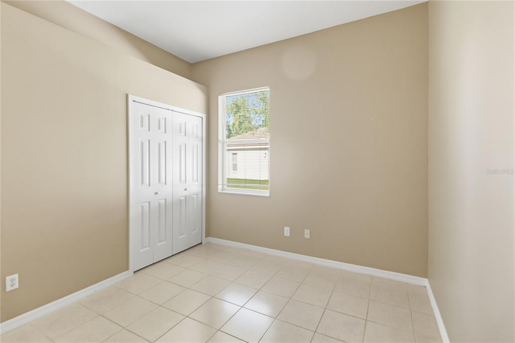 677 Buckhaven Loop Ocoee, FL 34761 - Photo 20 of 41 an empty room with windows