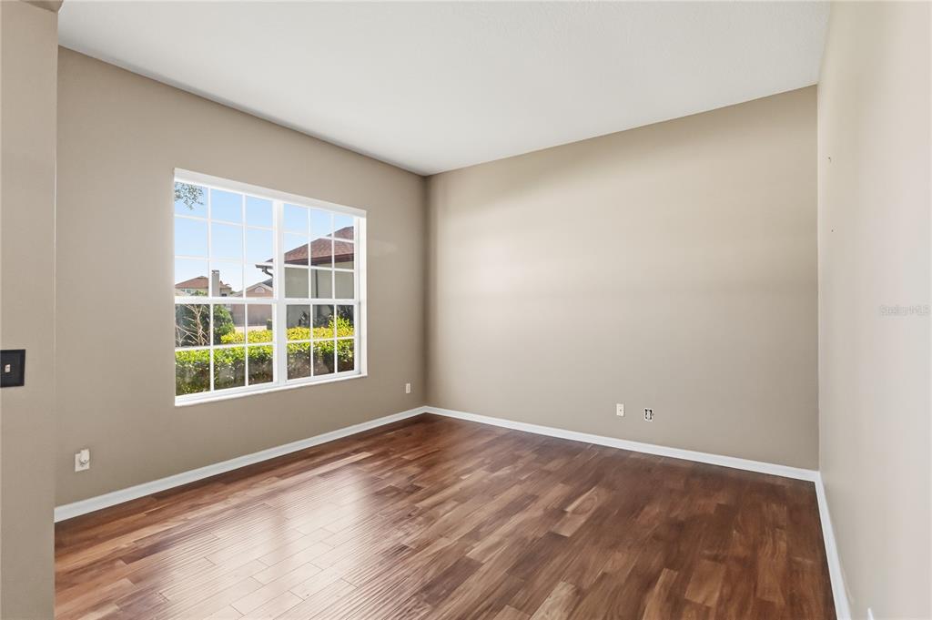 677 Buckhaven Loop Ocoee, FL 34761 - Photo 5 of 41 an empty room with a window