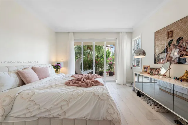 a bed room with a bed and a window