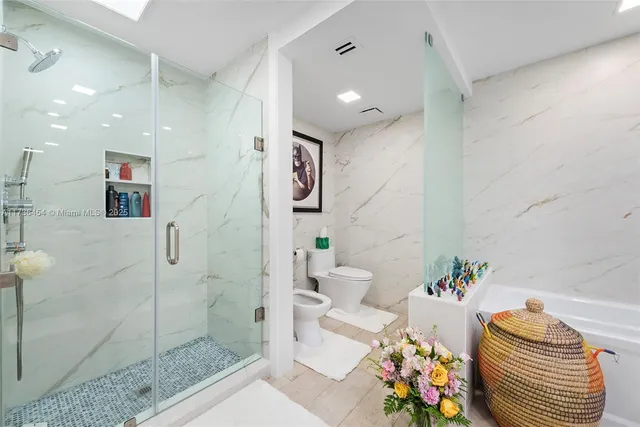 a view of a backyard with plants