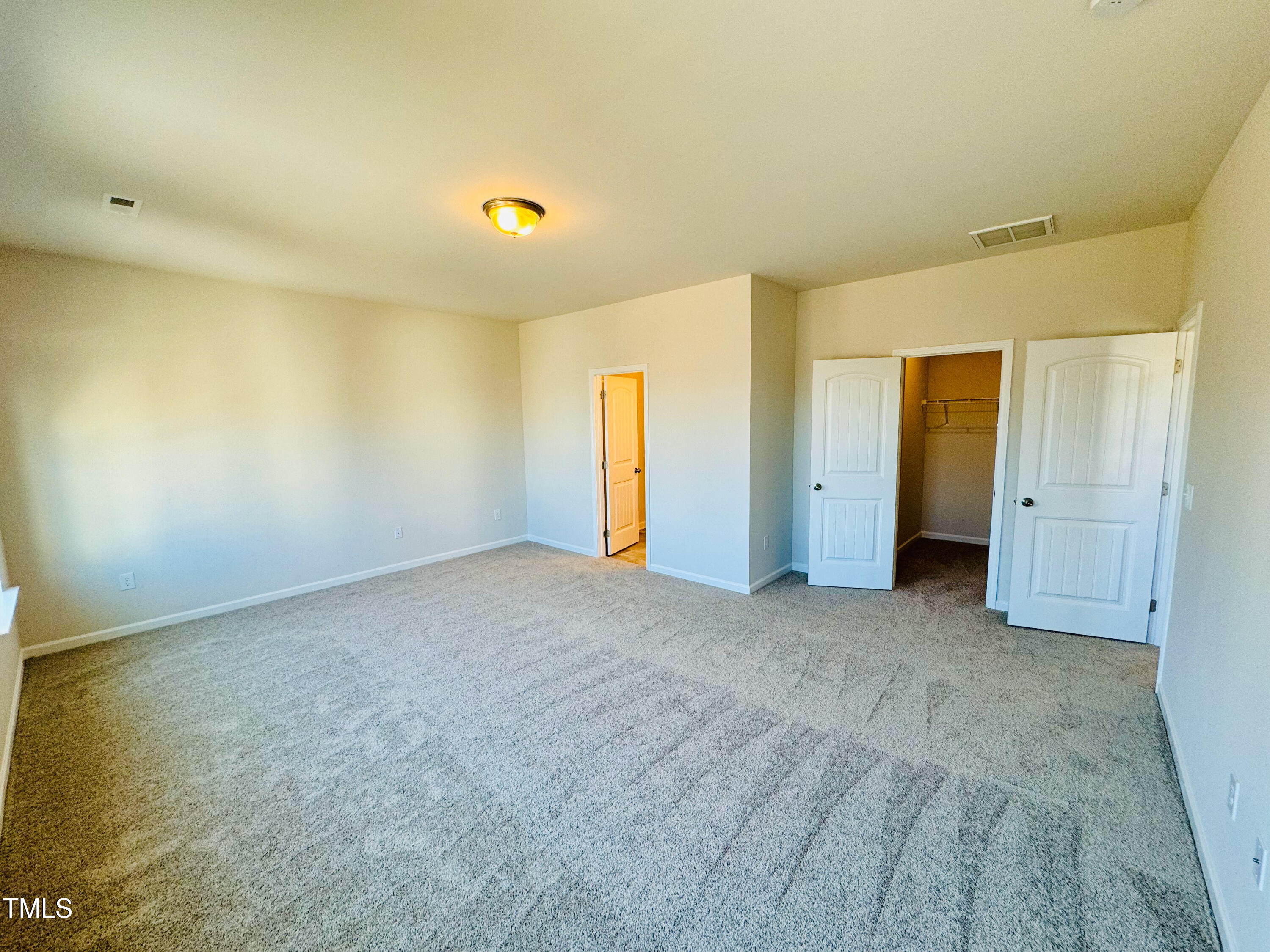 134 Commons Circle, Unit 232 Clayton, NC 27520 - Photo 13 of 37 a view of an empty room