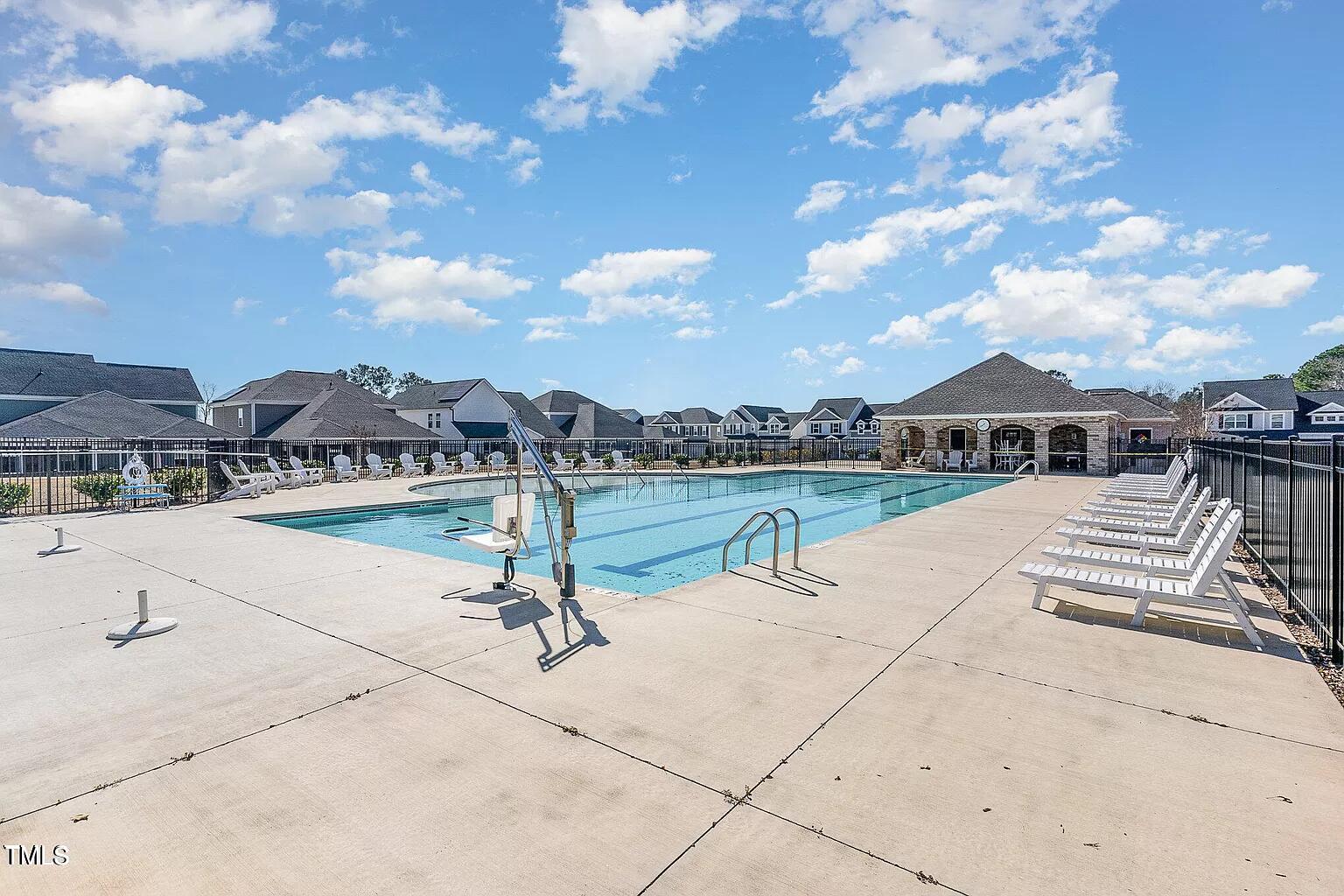 134 Commons Circle, Unit 232 Clayton, NC 27520 - Photo 34 of 37 a view of a terrace with television