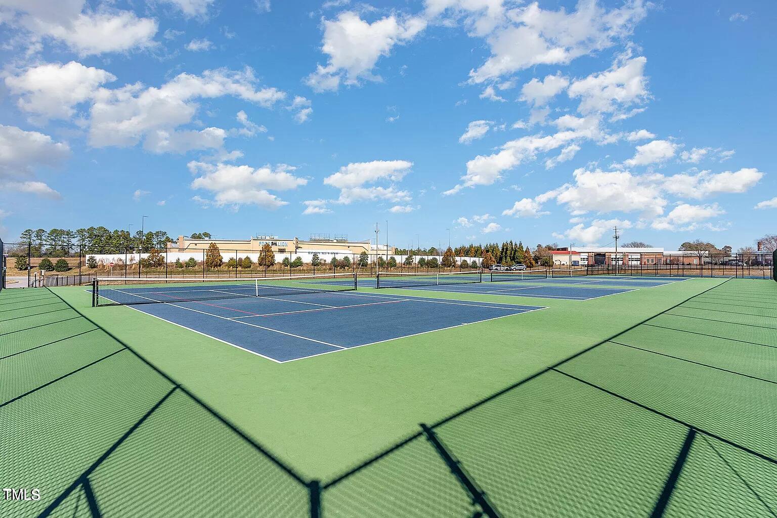 134 Commons Circle, Unit 232 Clayton, NC 27520 - Photo 35 of 37 a view of a tennis court