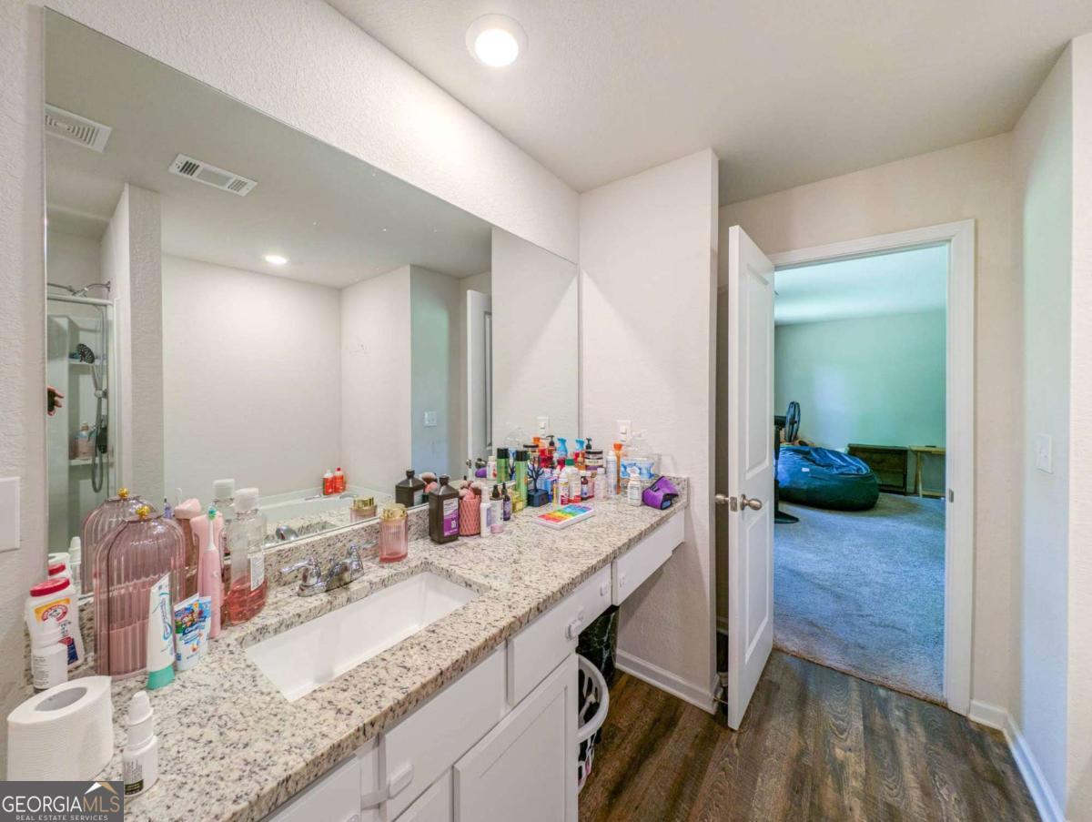 653 Meadows Farm Way Monroe, GA 30655 - Photo 24 of 34 a room with sink and view kitchen