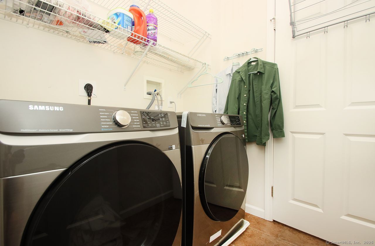 35 Todd Street, Unit 103 Hamden, CT 06518 - Photo 13 of 40 a utility room with dryer and washer