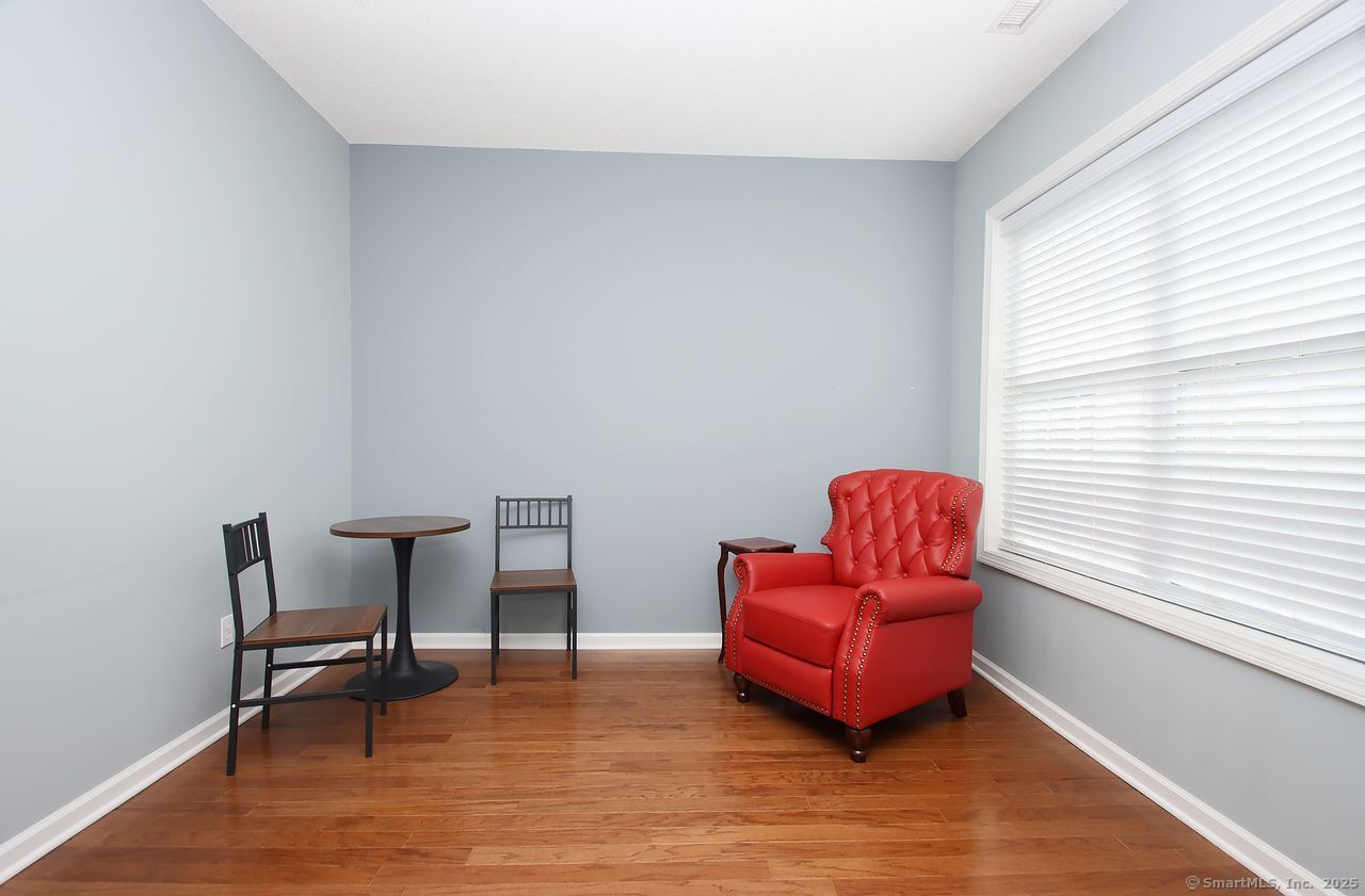 35 Todd Street, Unit 103 Hamden, CT 06518 - Photo 22 of 40 a living room with furniture and a window