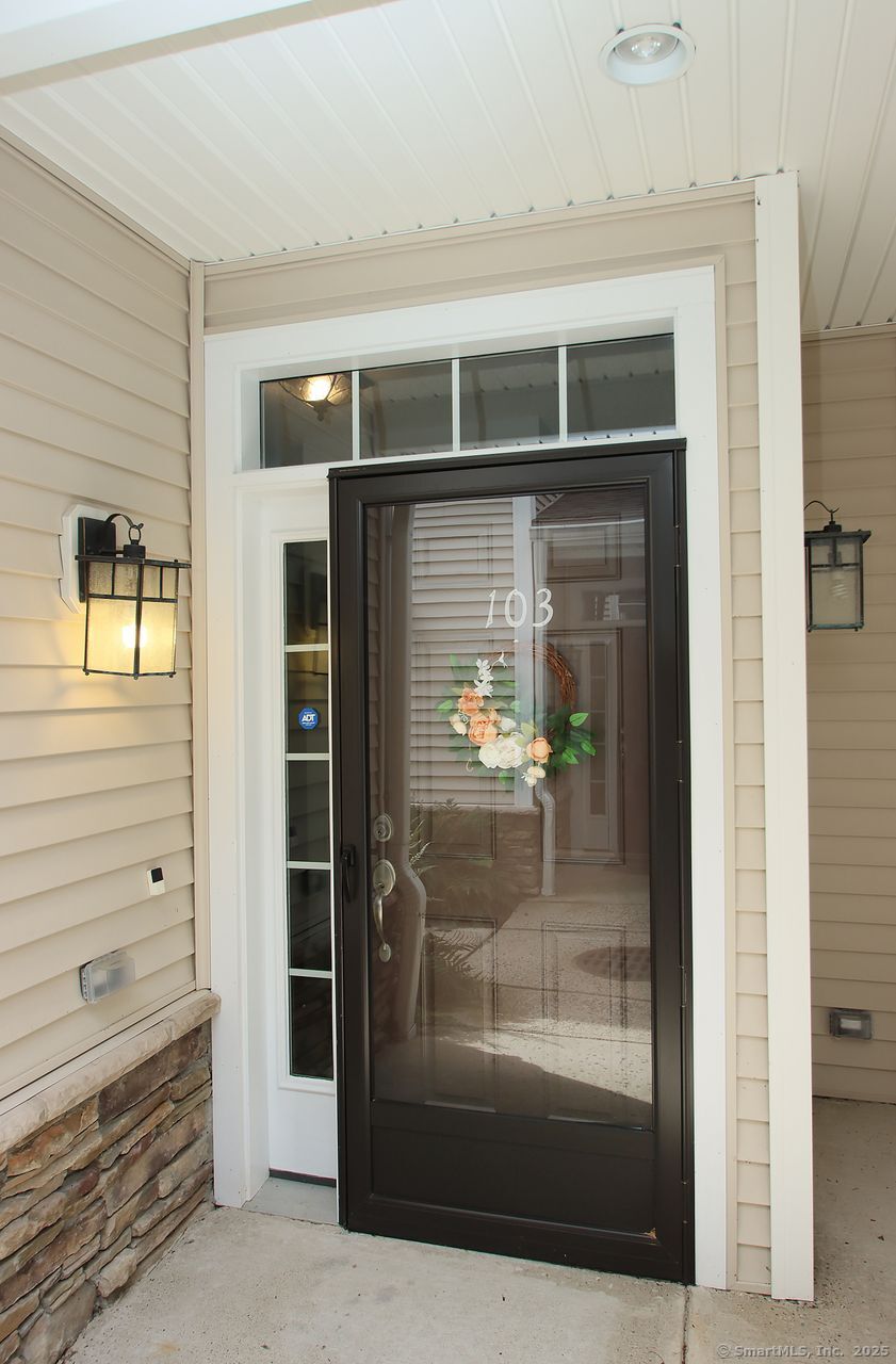 35 Todd Street, Unit 103 Hamden, CT 06518 - Photo 5 of 40 a window with a glass door
