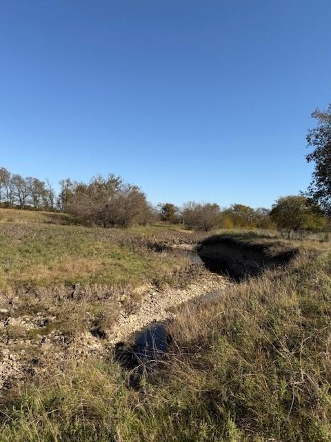 124.75-ac Donald Road Krum, TX 76249 - Photo 11 of 13 a view of lake with mountain
